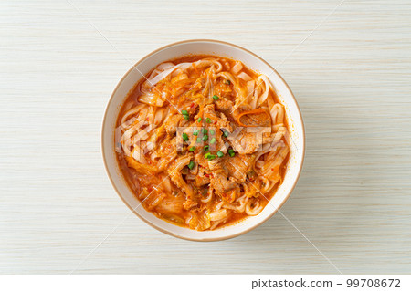 Korean udon ramen noodles with pork in kimchi soup Korean udon ramen noodles with pork in kimchi soup 99708672