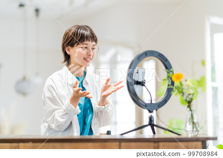 Young woman delivering online Young woman delivering online 99708984