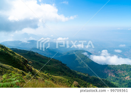 beautiful mountain layer with clouds and blue sky beautiful mountain layer with clouds and blue sky 99709361
