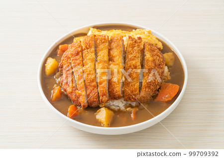 curry rice with fried pork cutlet and creamy omelet curry rice with fried pork cutlet and creamy omelet 99709392