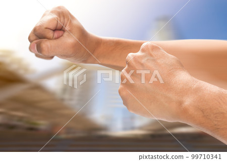 The man clenched fist. The man clenched fist. 99710341