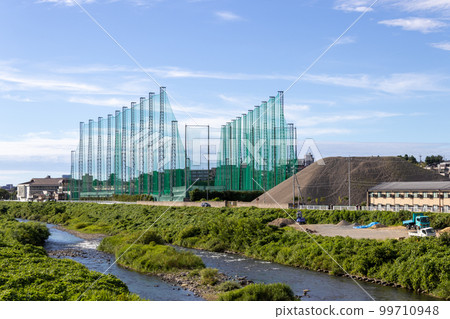 Outdoor golf driving practice range, Kanazawa, Japan. Outdoor golf driving practice range, Kanazawa, Japan. 99710948