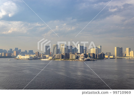 View of Tokyo from Rainbow Bridge, Odaiba, Tokyo Bay. 99710969