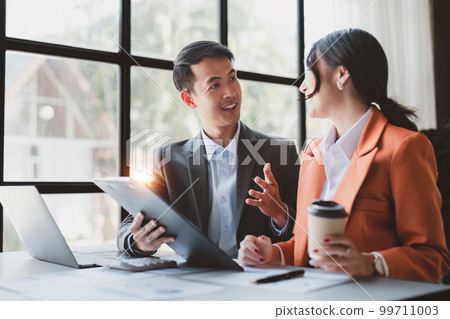 Business People Meeting Research finance report by laptop. management strategy analysis financial accounting concept Business People Meeting Research finance report by laptop. management strategy analysis financial accounting concept 99711003