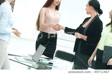 handshake of Manager and client in office room handshake of Manager and client in office room 99711467