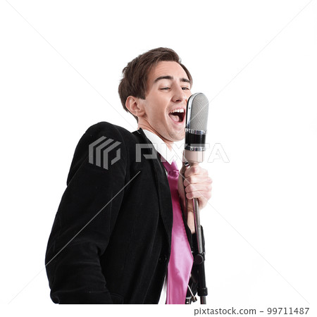 stylish guy with a microphone singing jazz 99711487
