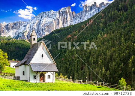 Nova Levante, Italy. Bolzano region scenery with Cimon del Latemar, Dolomites mountains. Nova Levante, Italy. Bolzano region scenery with Cimon del Latemar, Dolomites mountains. 99712728