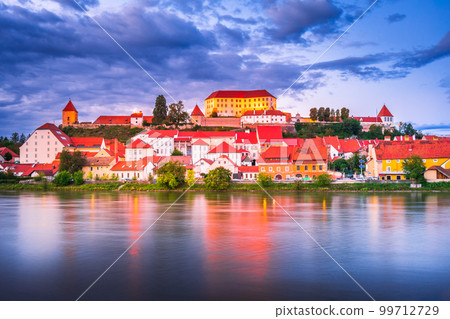 Ptuj, Slovenia. Beautiful sunset time over Drava River and oldtown, Styria historical region 99712729
