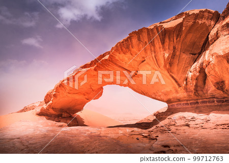 Wadi Rum, Jordan - Kharaz Jebel rock bridge famous Arabia Desert. Wadi Rum, Jordan - Kharaz Jebel rock bridge famous Arabia Desert. 99712763