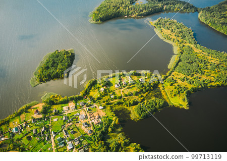 Lyepyel District, Lepel Lake, Beloozerny District, Vitebsk Region. Aerial View Of Residential Area With Houses In Countryside. Top View Of Island Pension Lode From High Attitude In Autumn Sunny Day 99713119