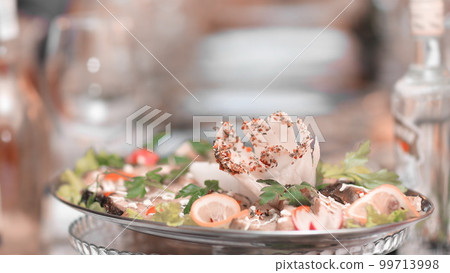 close up.the dish at the restaurant on blurred background close up.the dish at the restaurant on blurred background 99713998