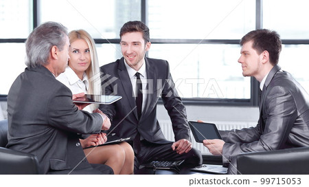 business partners approving the transaction with a handshake 99715053