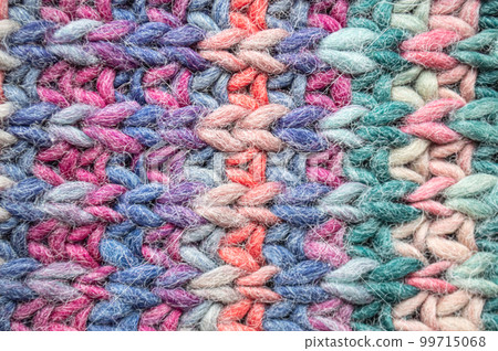 Handmade knitted background with macro woven threads. Handmade knitted background with macro woven threads. 99715068