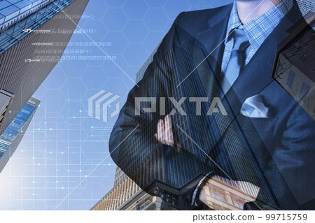 Elite businessman and high-rise office building 99715759