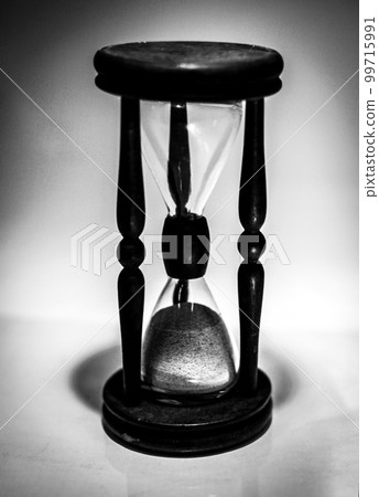hourglass on dark background.the concept of time 99715991