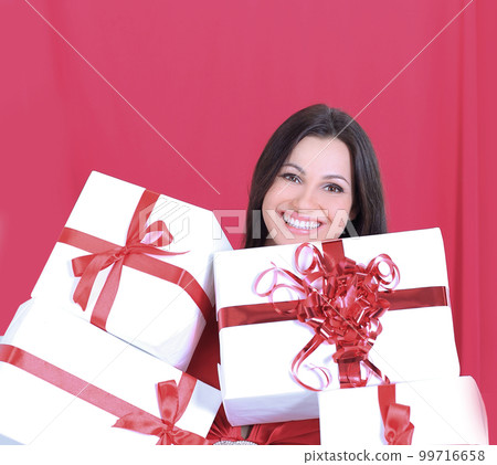 happy pretty woman holding many boxes with presents. 99716658