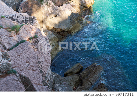 Top view of beautiful blue sea surface and fantastic rocky coast, Montenegro Top view of beautiful blue sea surface and fantastic rocky coast, Montenegro 99717311