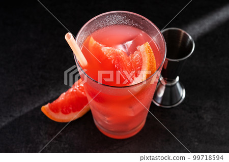 Sea breeze cocktail on black background Sea breeze cocktail on black background 99718594