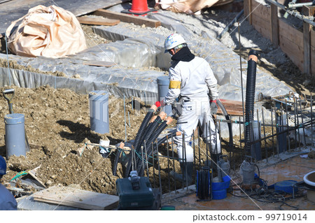 Construction site, building foundation work, water and electricity plumbing work 99719014