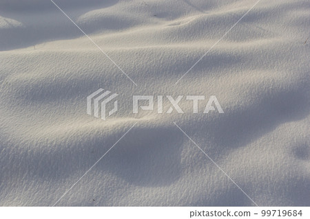 background of fresh snow texture in blue tone background of fresh snow texture in blue tone 99719684