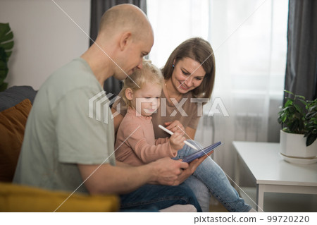 Cochlear implant system. Installation cochlear implant on child girl ear for restores hearing. Kid hears after hear return to normal 99720220