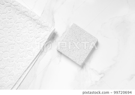 Beauty cosmetics product presentation scene made with white towel and pumice stone, flat lay. 99720694