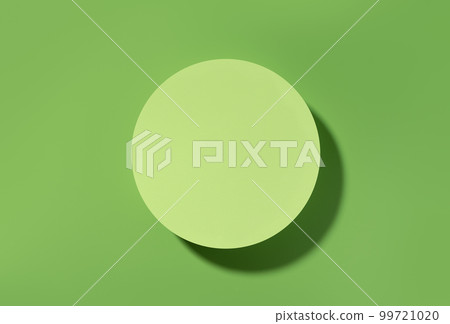 Green circle scene for product presentation, green stage flat lay. Studio photography. 99721020