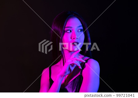 Young asian woman portrait in neon lights. 99721041