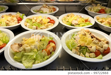 Caesar salad with chicken and crackers Caesar salad with chicken and crackers 99722668