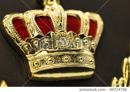 Awards ceremony shield with a golden crown design 99724796