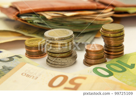 wallet with money, a pile of coins, banknotes background. Concept of saving money. Horizontal, banner, mockup, for your design wallet with money, a pile of coins, banknotes background. Concept of saving money. Horizontal, banner, mockup, for your design 99725109