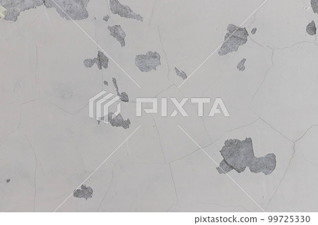 old plastered wall with cracks and chips 99725330