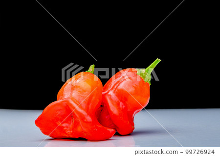 The bishop's crown, Christmas bell, or joker's hat, is a pepper, a cultivar of the species Capsicum baccatum var. pendulum, 99726924