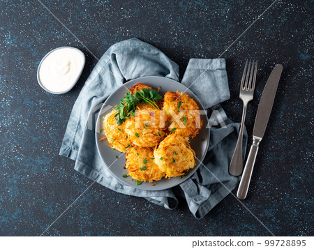Potatoes pancakes latkes, flapjacks, hash brown 99728895