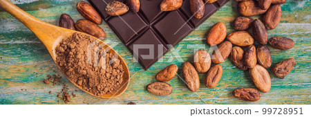 Chocolate and cocoa beans on color wooden background BANNER, LONG FORMAT 99728951