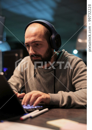 Database admin typing code and creating algorithm for it startup company, writing html script on multiple monitors. App developer working with temrinal window and programming source code. Database admin typing code and creating algorithm for it startup company, writing html script on multiple monitors. App developer working with temrinal window and programming source code. 99732228