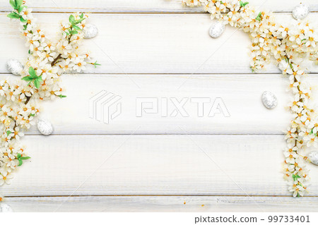 Easter eggs wood. April floral nature, white happy easter eggs on wood spring background. Easter pattern with place for text. Easter eggs wood. April floral nature, white happy easter eggs on wood spring background. Easter pattern with place for text. 99733401