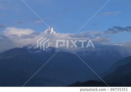 Machapuchare seen from Sarangkot, Pokhara, Nepal 99735351