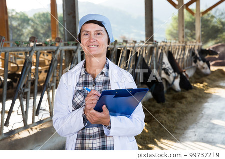 Portrait of woman quality expert who is standing 99737219