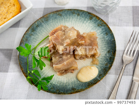 Pieces of homemade pork aspic, meat jelly Pieces of homemade pork aspic, meat jelly 99737493