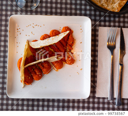 Spicy Muhammara dip from Aleppo pepper and walnuts with flatbread Spicy Muhammara dip from Aleppo pepper and walnuts with flatbread 99738567