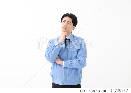 Men in work clothes, white background, worried 99739582
