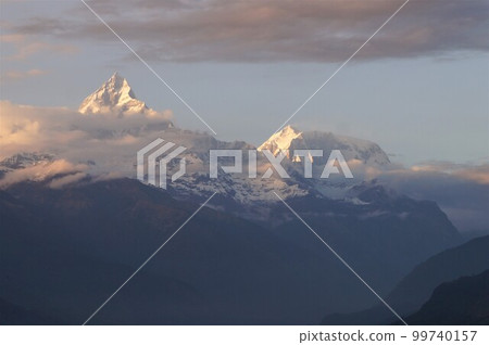 Machapuchare and Annapurna III peak seen from Sarangkot, Pokhara, Nepal 99740157