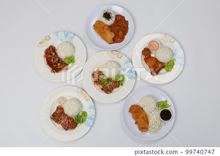 set of various plates of food, deep-fried chicken, and deep-fried pork isolated on white background, top view. set of various plates of food, deep-fried chicken, and deep-fried pork isolated on white background, top view. 99740747