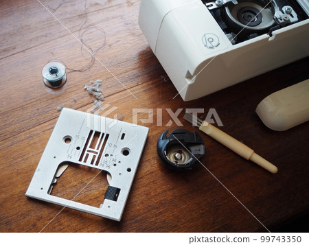 Sewing machine maintenance and bobbin case cleaning 99743350
