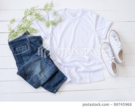 White T Shirt mockup weathered, canvas shoes and Jeans on white wood background White T Shirt mockup weathered, canvas shoes and Jeans on white wood background 99745968