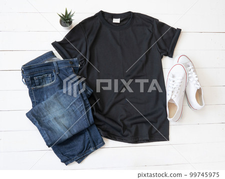 Black T Shirt mockup weathered, canvas shoes and Jeans on white wood background Black T Shirt mockup weathered, canvas shoes and Jeans on white wood background 99745975
