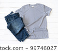 Grey T Shirt mockup and Jeans on white wood background 99746027