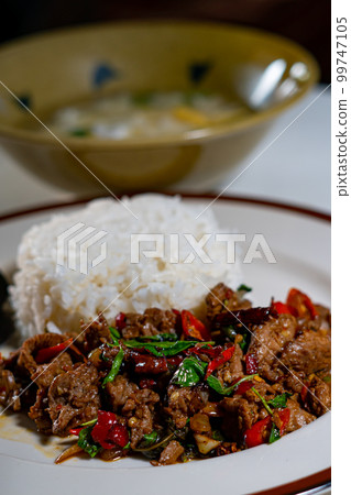 stir-fried basil with pork and fried egg stir-fried basil with pork and fried egg 99747105