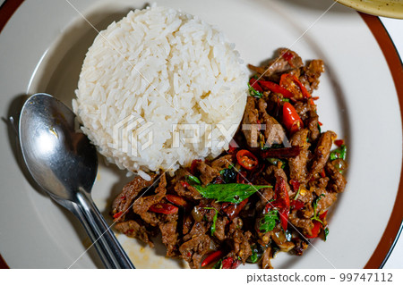 stir-fried basil with pork and fried egg stir-fried basil with pork and fried egg 99747112